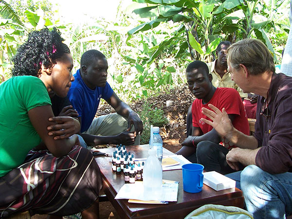 ARHF trainees, 3 young people, are being trained to use PC remedies in Jinja in Uganda